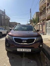 كيا سورنتو موديل ٢٠١٢ شكل ٢٠١٣ السياره ماشيا ٢٠٠ فقط  لون اسود بيتنجان...