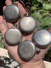 شلعة • ساعات جيبية • فضة
