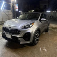 كيا سبورتج موديل 2021 رقم بغداد باسمي السياره وارد امريكي بيه حادث باب...