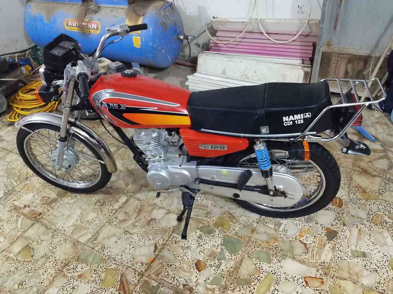 درجه للبيع نضيفه بدون ميسان حي العسكري ***********السعر 700وبيه مجال شاصي امتياز ومكينه نامه نضيفه
