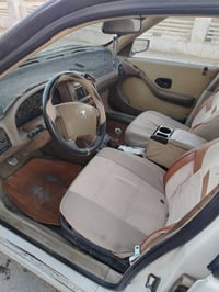 بيجو GLX405 مديل 2009 نظيفه رقم بغداد ثاني يوم تحويل الاتصال 077256383...