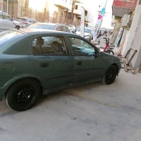 وبركاته  للبيع اوبل استرا 2002 بغداد انكليزي وبسمي كير ومحرك مكفول تخم...