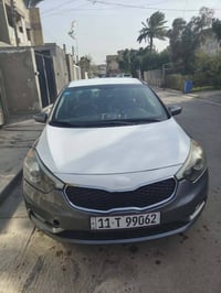 وبركاته كيا فورتي موديل 2015 محرك 2000 GDI امريكي  رقم بغداد الجديد  م...