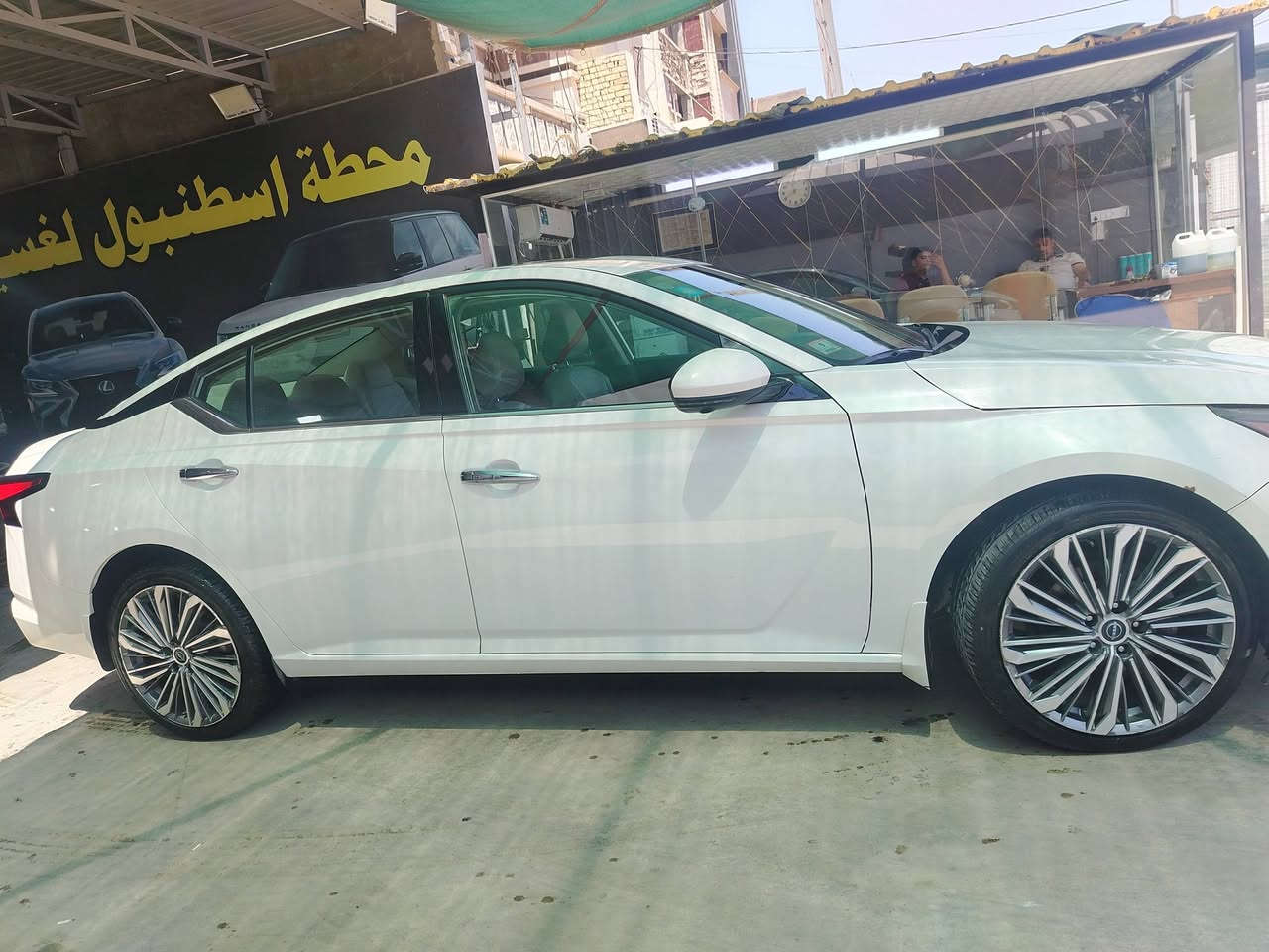 🚗 نيسان ألتيما 2023 SL – فول مواصفات 1/1 🚗
🔹 رقم بغداد
🔹 ماشية 63 ألف كم

✅ فتحة سقف سلايد
✅ بصمة أبواب + بصمة تشغيل
✅ تشغيل عن بُعد (Remote Start)
✅ شاشة كبيرة ديجيتال
✅ شحن لاسلكي (Wireless Charger)
✅ كاميرات 360° (أمامية + جانبية + خلفية)
✅ هاند بريك إلكتروني + Auto Hold
✅ Auto Start / Stop
✅ رادار أمامي
✅ رادار النقطة العمياء
✅ رادار خلفي للتحذير من الاصطدام
✅ حساسات أمامية وجانبية وخلفية
✅ أنظمة قيادة NORMAL / SPORT
✅ مقاعد جلد كهربائية مع هيتر
✅ تبريد قطعتين
✅ لايتات LED أمامية وخلفية
✅ ويل كروم أصلية

🛠 ملاحظة حادثها أمامي تم تبديل الدعامية الأمامية والبنيد، ويوجد بارد بسيط جداً بالجاملغ الأمامي الأيسر فقط، والسيارة خير من الله وما بيها أي نقص أو ملاحظة أخرى.

السعر ١٥٠

📍 بغداد – الغزالية
📞 ***********
