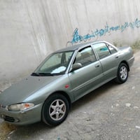 بروتون • ٢٠٠٤ • اوتوماتيك
