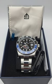 ساعه باجاني ديزاين باتمان ساعه جديد ما مستخدم سعر خاص واتساب 077828266...