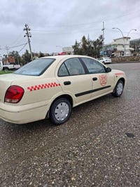 نیسان سەنی مۆدێل 2005 گێڕ عادی مەکینە سپی گێڕو مەکینەی بەشەرت بەس پێشی...