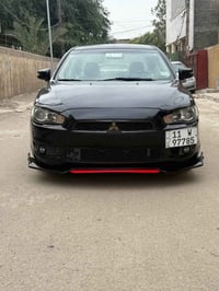 لانسر قرش 2016 خليجي كفاله عامه بدون ضربه وصبغ وتبديل كله السياره مكفو...