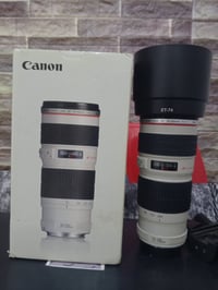 عدسة ٧٠/٢٠٠ • فتحة٤ • واسط كوت