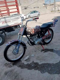 دراجه ايرانيه للبيع نامه مكان بغداد غزاليه سعر 400 وبيها مجال 07704857...