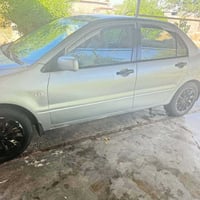 لانسر موديل 2006 للبيع محرك 2000 رقم بغداد الدولي السياره جاهزه من كل ...