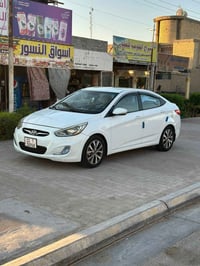 اكسنت • ٢٠١٥ • رقم بغداد