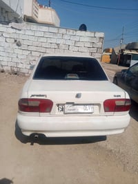 بروتون • موديل ٢٠٠٢ • النجف