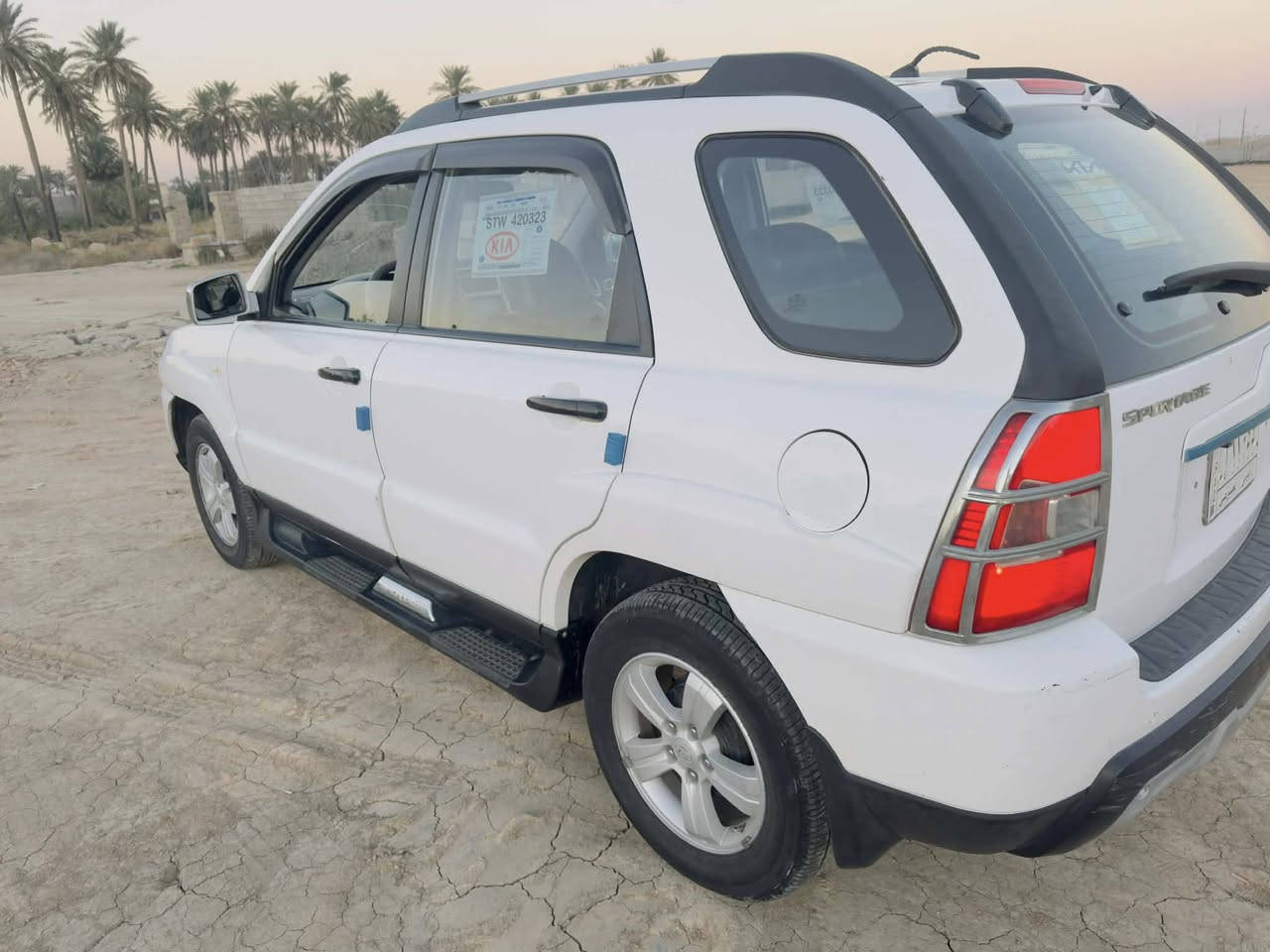 سبورتج موديل 2009 بيها صبغ بنيد فقط محرك كير جديد تخم تاير جديد صدر جديد كشنات جلد حساسات خلفي كامره شاشه تبريد ثلج رقم ديالى سعرها ١٢٢ بيها مجال *********** مكان سياره ديالى
