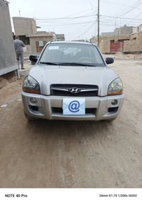 توسان 2009 بسمي رقم بغداد فول مواصفات فور ويل مكفولة حداديه امامي وخلف...