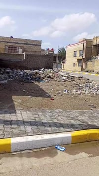 قطعه أرض مساحه 100م ركن مربعه في منطقه السكلات ال14 نافذه على شارع 20 ...