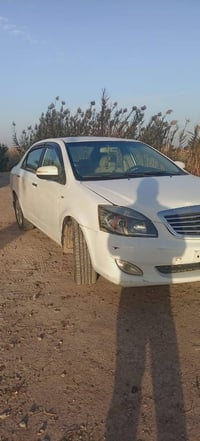 جيلي موبل اوتمتيك  موديل 2013  رقم بغداد سياره مصبوغه حزام وسعر 40 وبي...