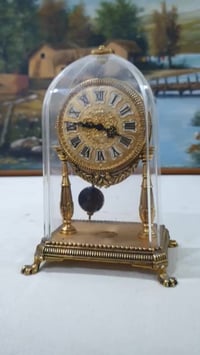 ساعة منضدية • تكويك