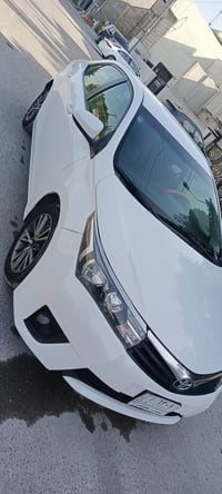 كورلا 2014 وارد امريكي محرك 1800  رقم ميساسلام عليكم....ان  السونر بال...