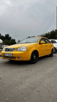 للبيع اوبترا اصفر تكسي مصفرة هيئة وغرامات رقم بغداد الانكليزي باسمي تح...