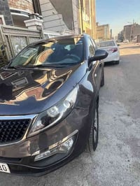 سبورتج 2015 خليجي   ماشيه 195  الف Km  رقم اربيل الجديد   هزه وسنويه ج...