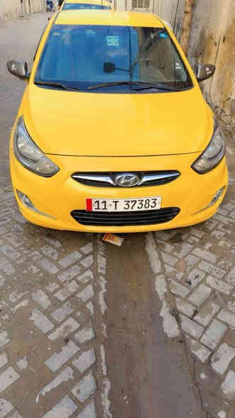 هونداي اكسنت موديل ٢٠١٣ بسمي أم صفره من كولشي رقم جديد المكينه والكير مكفولات كفاله عامه وارد أمريكي بكاني بغداد مدينه الصدر الرقم ***********
