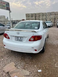 كورلا موديل ٢٠١٠   مكفوله اخوان سونار بلمنشور وكلشي موضح سعرها ١٢٥مكان...