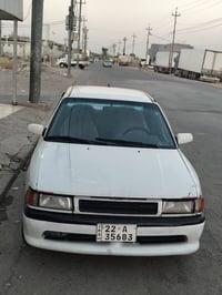 مازدا ٣٢٣ • ١٩٩٢ • جير عادي