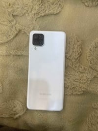 للبيع A12جديد مامفتحوح كلو شرط ماامبدل اي كلوجديد نضافه 100%رقم الهاتف...