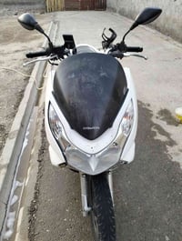 PCX • الجيل الاول • محرك مكفول