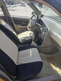 بيجو ٤٠٥ موديل ٢٠١٣ رقم بغداد مصفرة هيئة وغرامات تدفئة  تبريد  شغال كي...