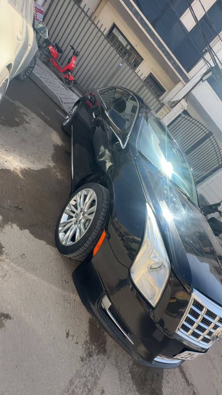 كديلاك xts فول
كشنات جلد وكهرباء 
تبريد وتدفأة بالكشن 
بردة كهرباء مع بردات خلفية 
تخم ويل مال 2019
شاشة كبيرة مع قاصة
السيارة هواي بيها مواصفات 
موديل 2013 
بصمة ابواب مع لدات ترحيب كاملة
السيارة بيها صبغ بنيد السعر 127 ورقة 
للاستفسار ***********
