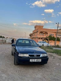 سياره فكترا موديل 1992حجم 18 كاربون بيها اسياره بسمي هزها جديد ارقام د...
