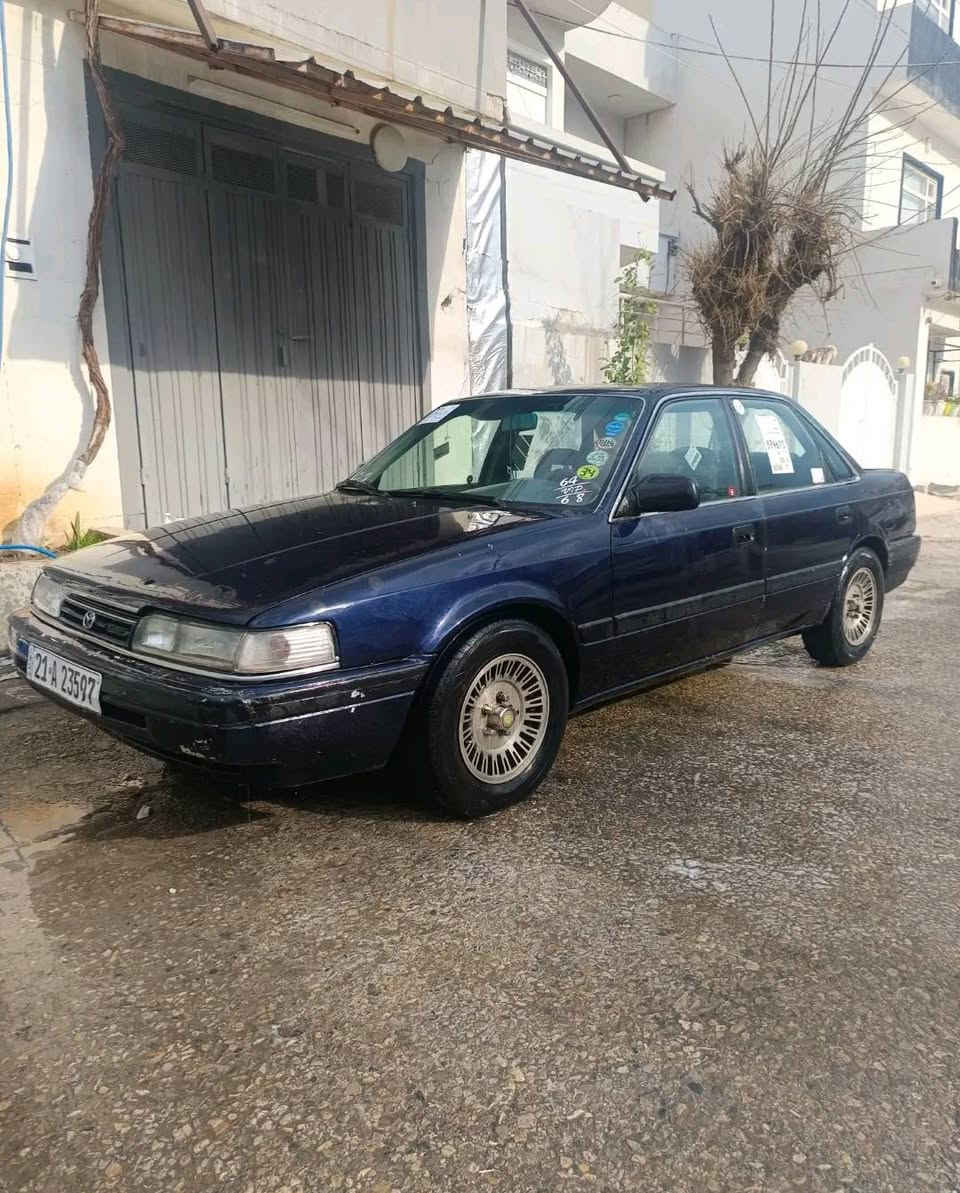 للبيع مازده 1992 رقم سليمانيه سنويه جديده وهزه وفحص هم جديد  كير اوتو  4جام كهربائي المكان سامراء  ***********
