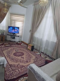 كربلاء الحر • دار • ١٠٠م