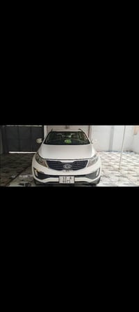 سيارة كيا سبورتاج موديل 2012 بدون صبغ فقط تقليمات ماشيه 120محرك كير شر...