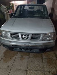 من رخصة الادمن بيك أب نيسان موديل 2003 مزاد الداخليه صبغ عام كير ومحرك...