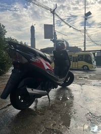 بغداد الشعب • شارع عدن • دراجة كهربائية