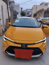 كرولا موديل ٢٠٢٤ هايبريت علامة اسود.رقم كركوك مشروع وطني سنوية جديد لح...