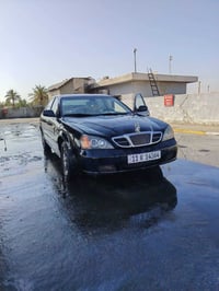 تم نزيل السعر بسبب ضرف سياره دايو ماكنوس للبيع العنوان بغداد الدوره عر...