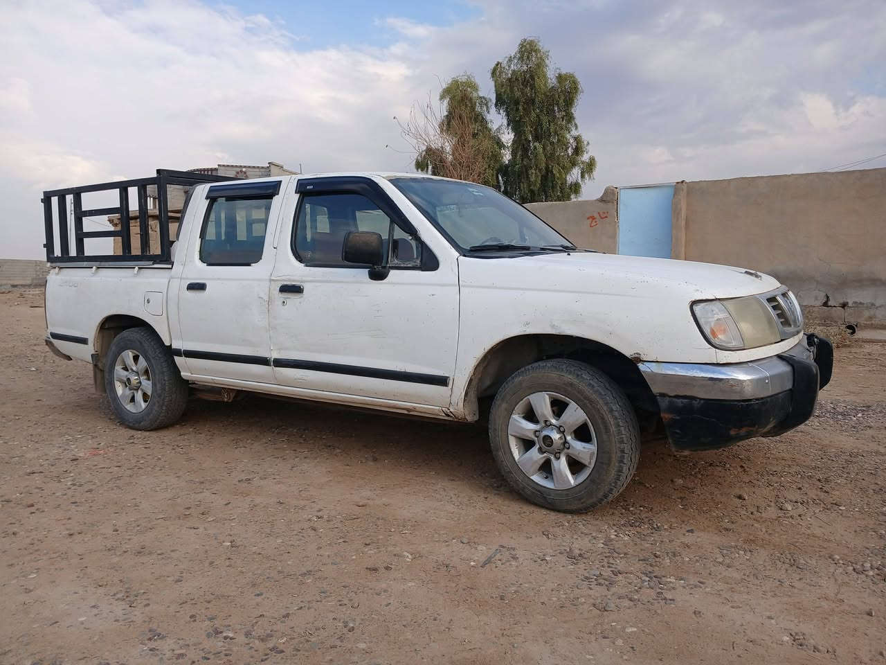 نيسان دبل موديل 2000 رقم صلاح الدين دولي 
محرك معمر قبل سبوع سياره صبغ عام باقي التفاصيل على الرقم ***********
