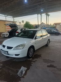 لانسر • ٢٠٠٤ • تحويل مباشر رقم بغداد