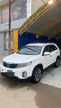 سورنتو ابيض • ٢٤٠٠ • رقم اربيل