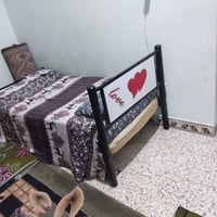 جرباية دوشك • ميز خشب • ام العصافير