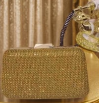 حذاء • حقيبة ذهبية • كربلاء