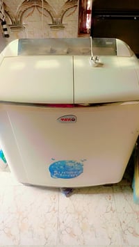 غسالة • حجم وسط • باب تجفيف خربان