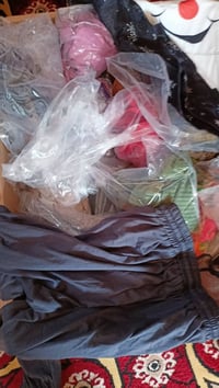 كارتون ملابس • أكثر من ٥٠ قطعة • للجملة