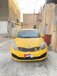 للبيع كيا ريو موديل 2012 رقم بغداد باسمي تحويل ثاني يوم  مصفرهه غرامات...