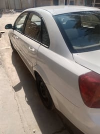 اوبترا ٢٠١٤ نظيفة وجاهزة بيضاء باسمي  سعرها ٨٨ مجال للاتصال ٠٧٧٠٩٧٣٨٧٤...