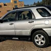 كيا سبورتج خليجي موديل 2009 بيه جاملج  باب اليسرالسعر 90$وبيه مجال للا...